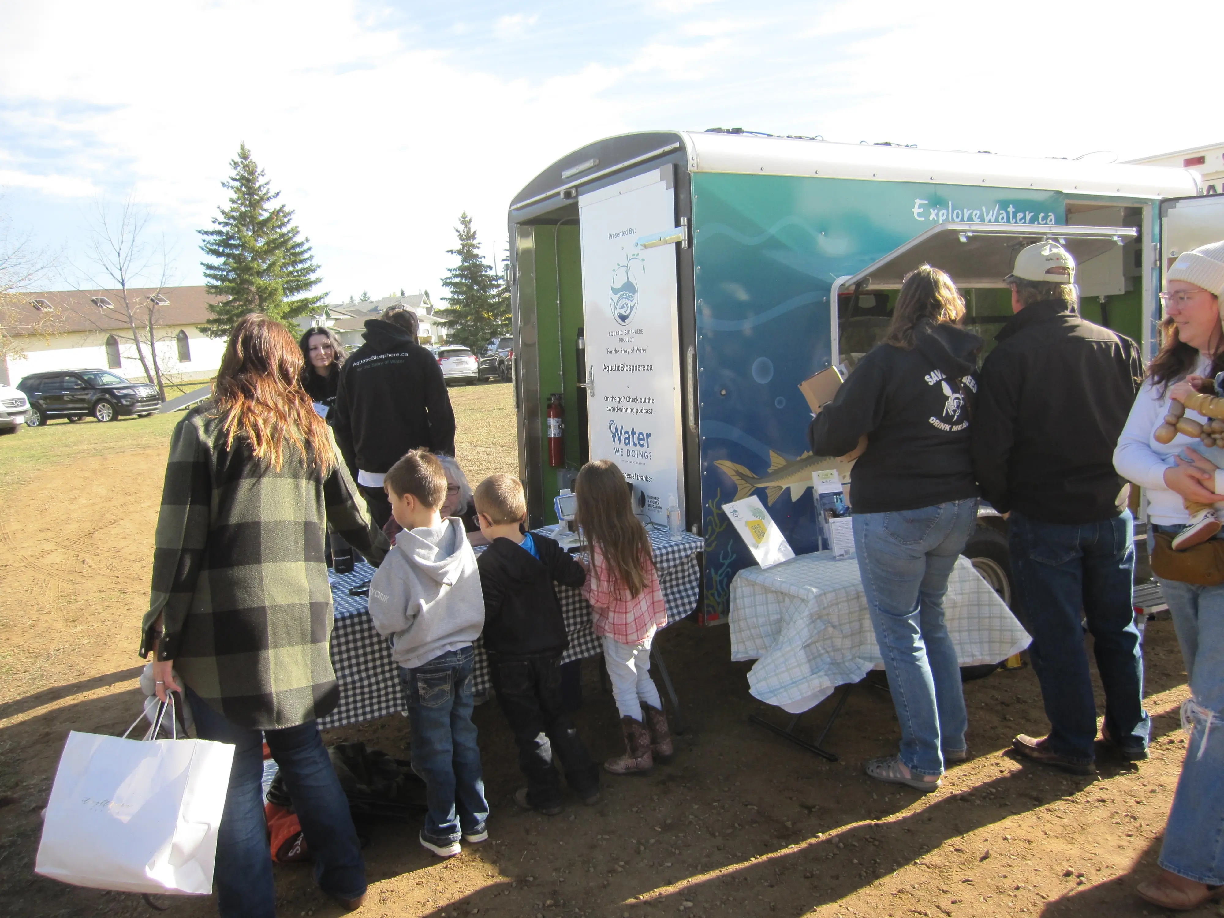 Minnow Trailer with people interacting at it.